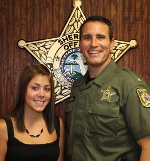 Scholarship Recipient Megan Richards, daughter of Child Protective Investigator Rhonda Stopler, is pictured with Pasco Sheriff Chris Nocco.