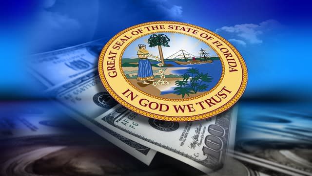 Seal of florida on top of $100 bills