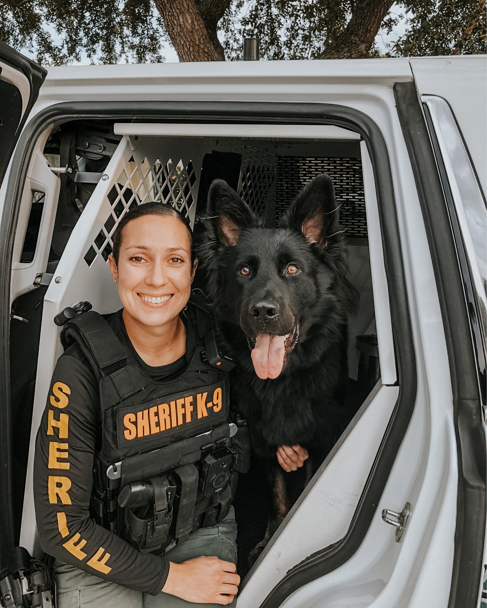 Sheriff with a black dog