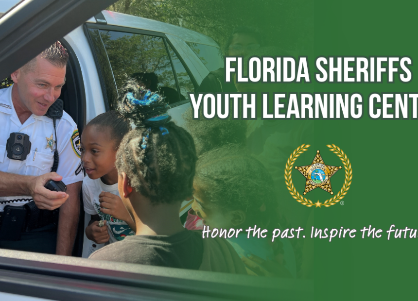 officer with children, Florida Sheriffs Youth Learning Center banner