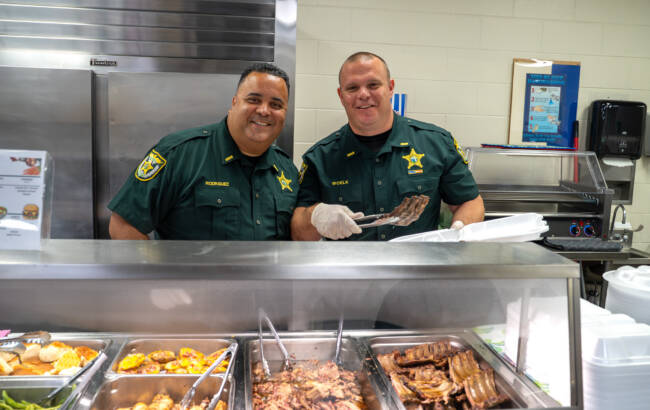 Corrections deputies serving food jail
